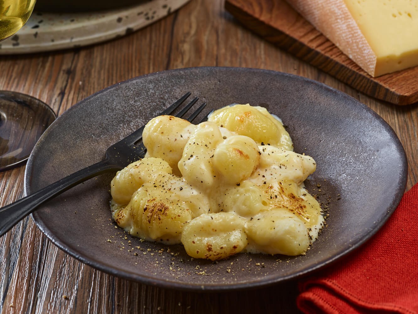 portion de gratin de gnocchis à la Raclette de Savoie